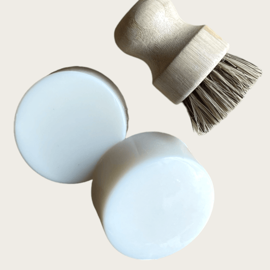 Refillism Castile Solid Dish Soap Bowl Refill for eco-friendly home cleaning, shown in a clear container with soap pieces inside.