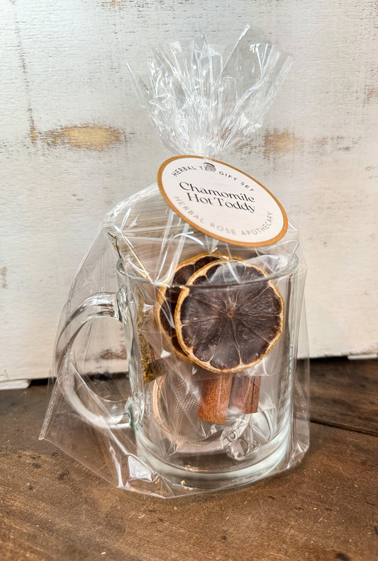 Herbalroseapothecary Chamomile Hot Toddy Gift Set with herbal tea pouches and mint infuser for soothing beverage preparation.
