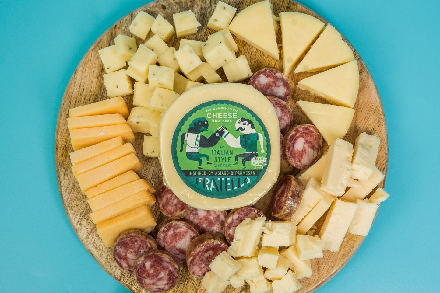 Deluxe Charcuterie Pack with assorted cured meats, cheeses, and accompaniments from Cheese Brothers, Inc.