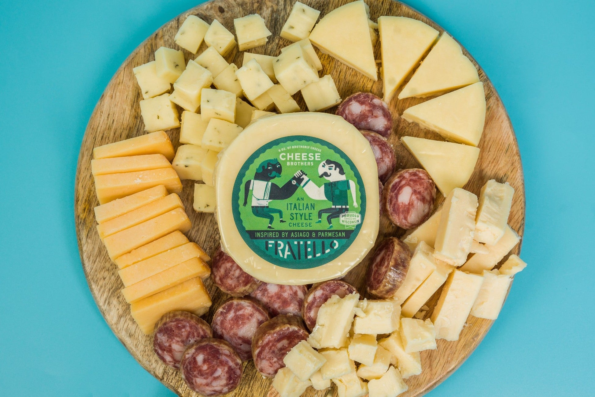 Deluxe Charcuterie Pack with assorted cured meats, cheeses, and accompaniments from Cheese Brothers, Inc.