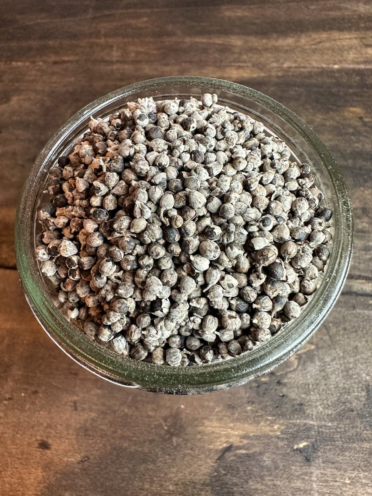 Small jar of dried chasteberry herbs in herbalroseapothecary herb jars collection, with a clear label and sealed lid.