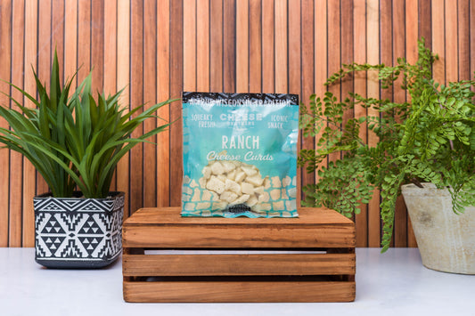 Wisconsin Cheese Brothers Inc. cheese curds sampler with 8 fresh-pack cheese curds in a gift bundle, ready for enjoy­ment.
