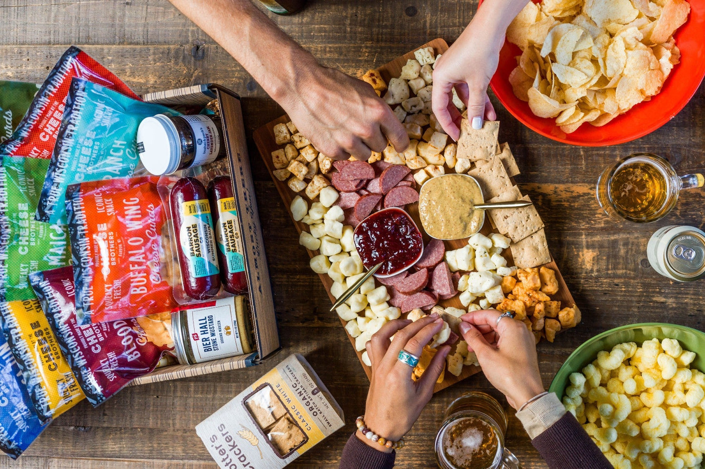 Deluxe Char-Curd-Erie Gift Box by Cheese Brothers Inc. featuring assorted cheeses, curds, and gourmet gift items.
