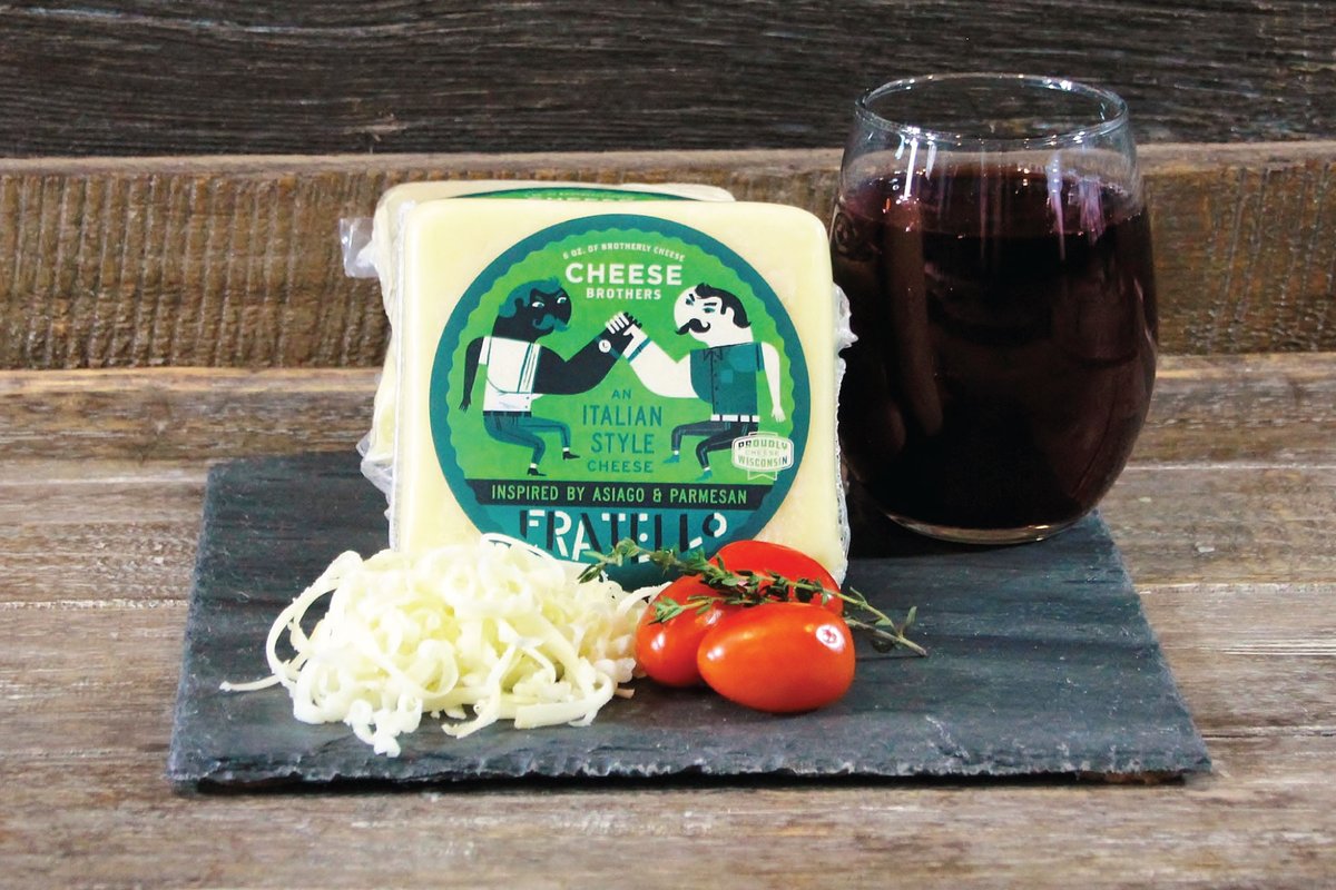 Cheese Brothers Inc. "Have a Cheesy Birthday" gift basket with assorted cheeses, snacks, and birthday-themed treats.