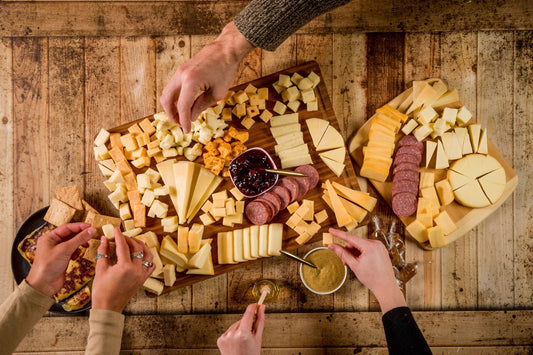 Cheese Brothers Inc. Just About Everything Box with assorted cheeses, snacks, and gift items in a gift bundle.