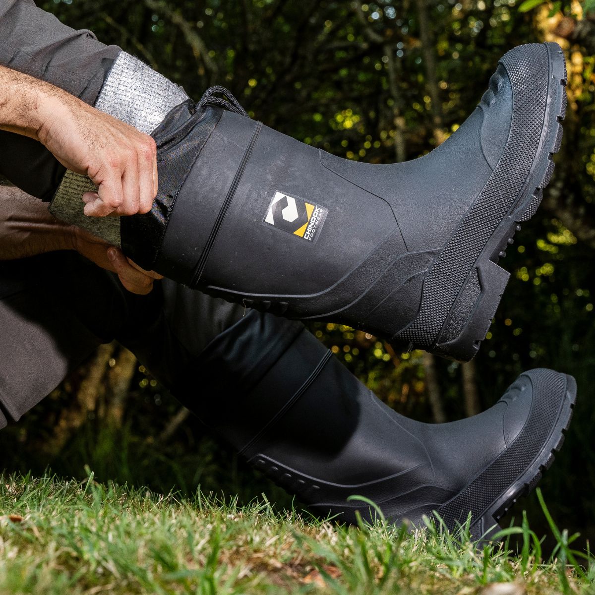 Chinook® Badaxe Regrind 15-inch waterproof rubber boot in black, durable rubber footwear for outdoor work and wet conditions.