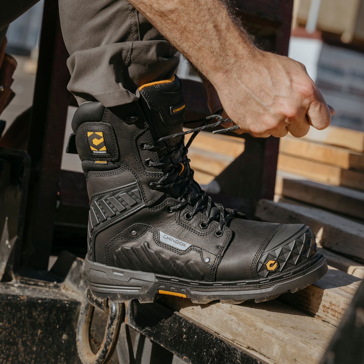Black Chinook® Scorpion 9-inch composite toe waterproof work boot for men, featuring durable leather and slip-resistant sole.
