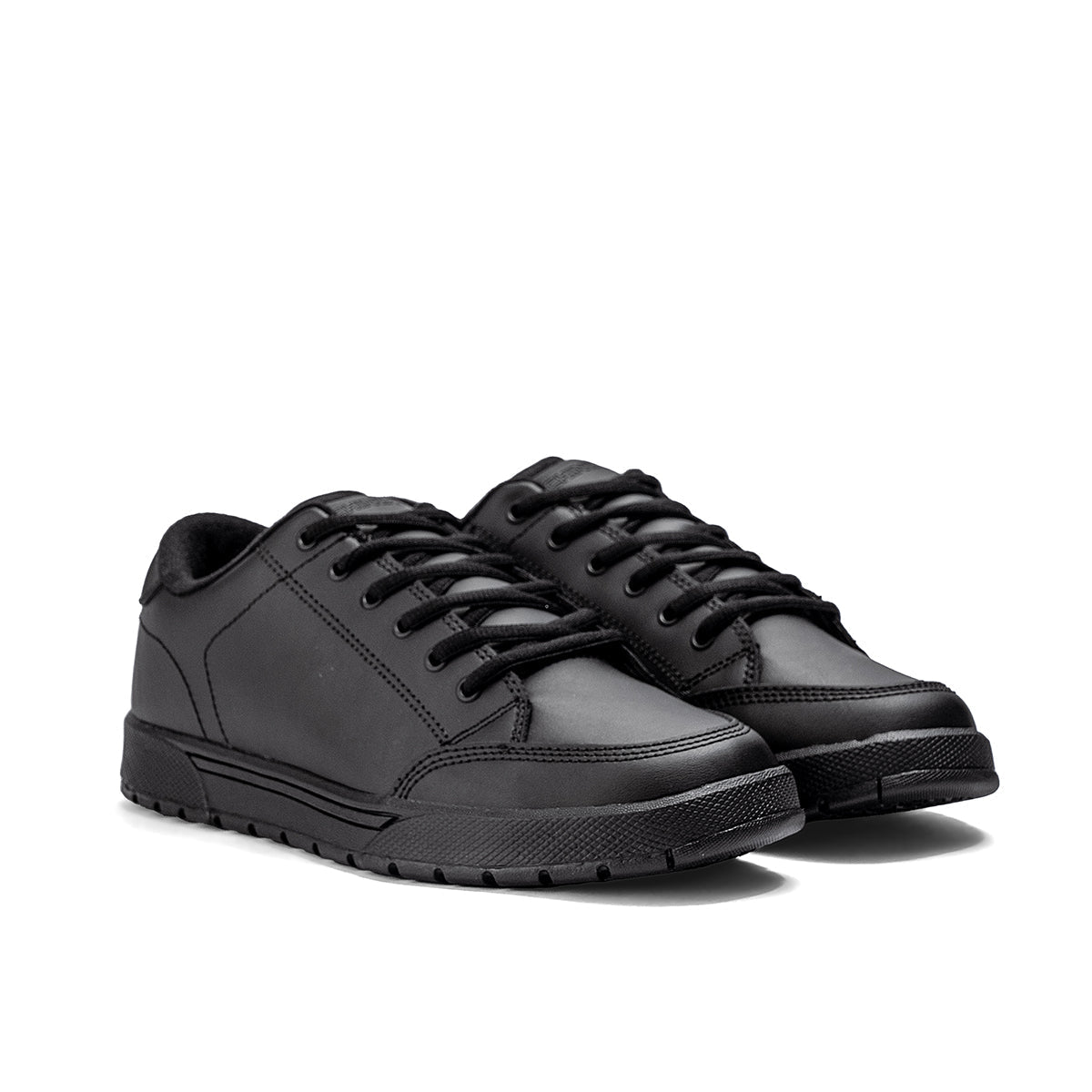 Chinook® Men’s black skater non-slip shoes for work and casual wear, featuring a durable slip-resistant outsole and stylish design.
