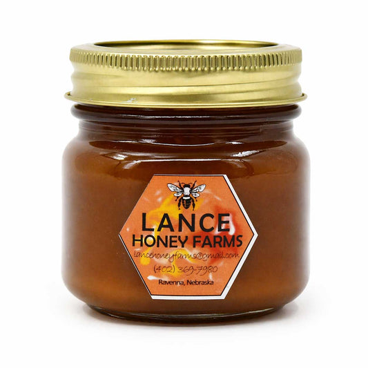 Creamed cinnamon honey jar from Lance Honey Farms, 12 oz, showcasing the smooth, cinnamon-infused honey spread.