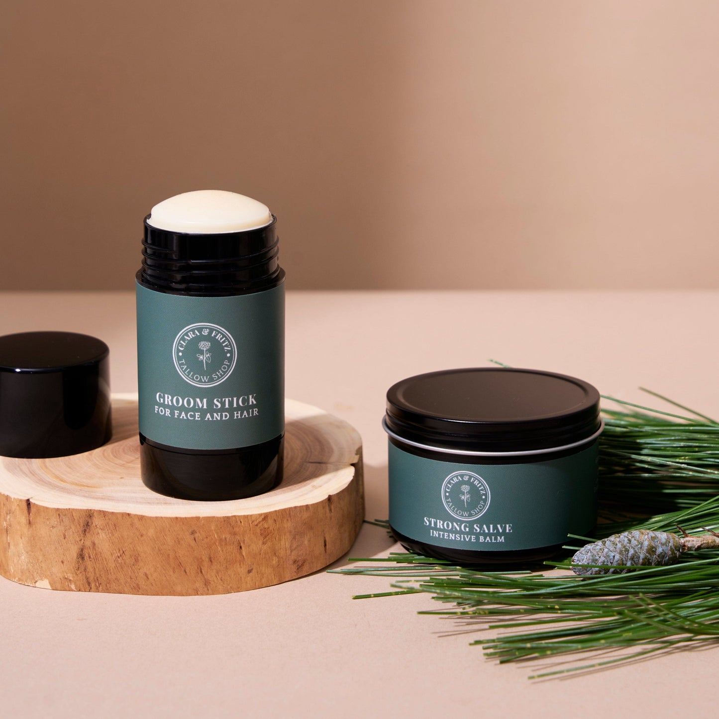 Clara & Fritz Tallow Shop Groom Stick with natural ingredients, shown in a sleek container, ideal for pet grooming and conditioning.