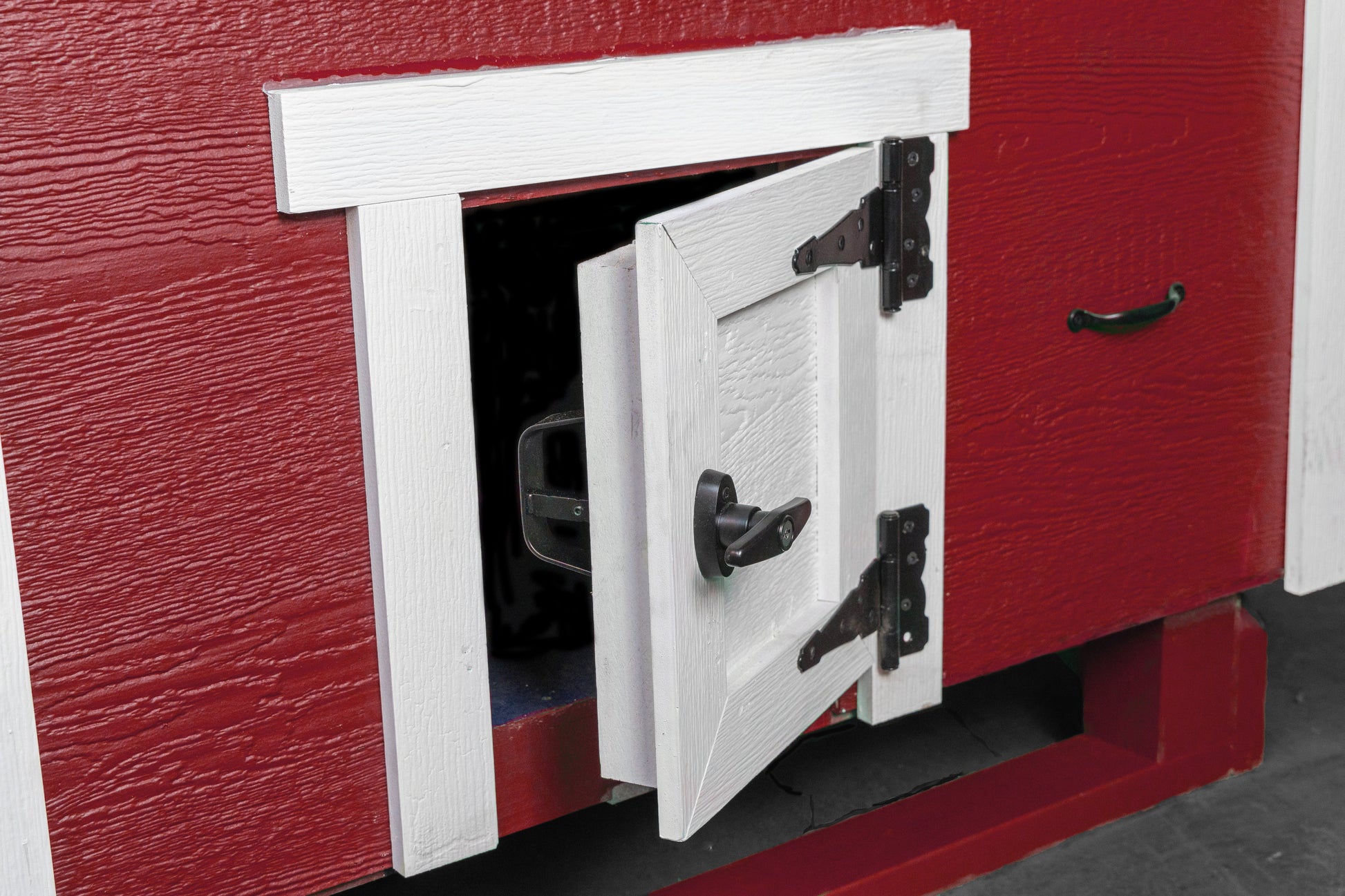 OverEZ large chicken coop with a classic chicken door, designed to comfortably house up to 15 chickens in a durable outdoor coop.