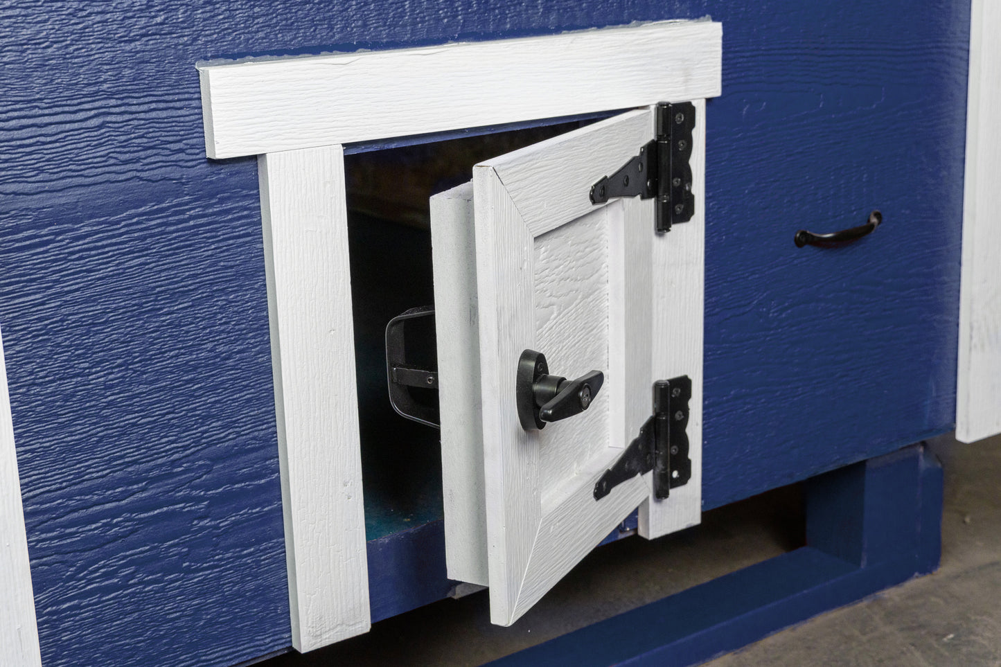 OverEZ Chicken Coop large chicken coop door with a secure latch, suitable for housing up to 15 chickens in a spacious outdoor setup.