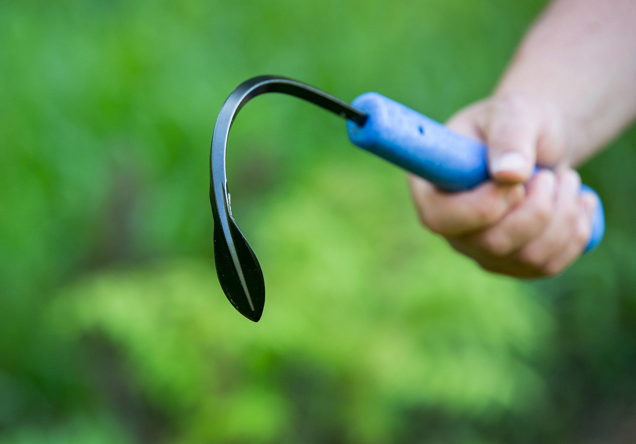 CobraHead Original Weeder and Cultivator garden tool with ergonomic handle and metal head for weeding and cultivating soil.