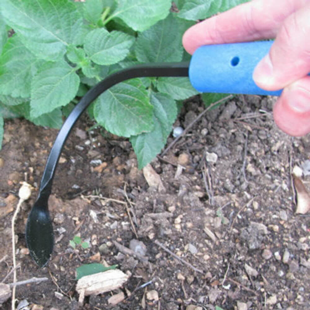 CobraHead Original Weeder and Cultivator Garden Tool with ergonomic handle for weeding and cultivating soil in gardens.