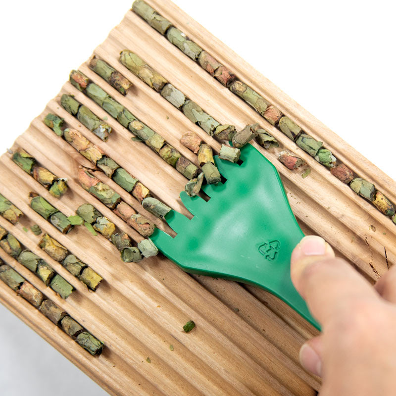 CrownBees Cocoon Harvesting Comb with fine teeth for gently harvesting bee cocoons in apiary beekeeping.