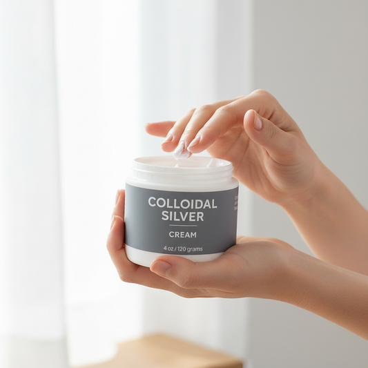 Close-up of Taylor Made Organics Colloidal Silver Organic Cream, showing its smooth, creamy texture in a jar.