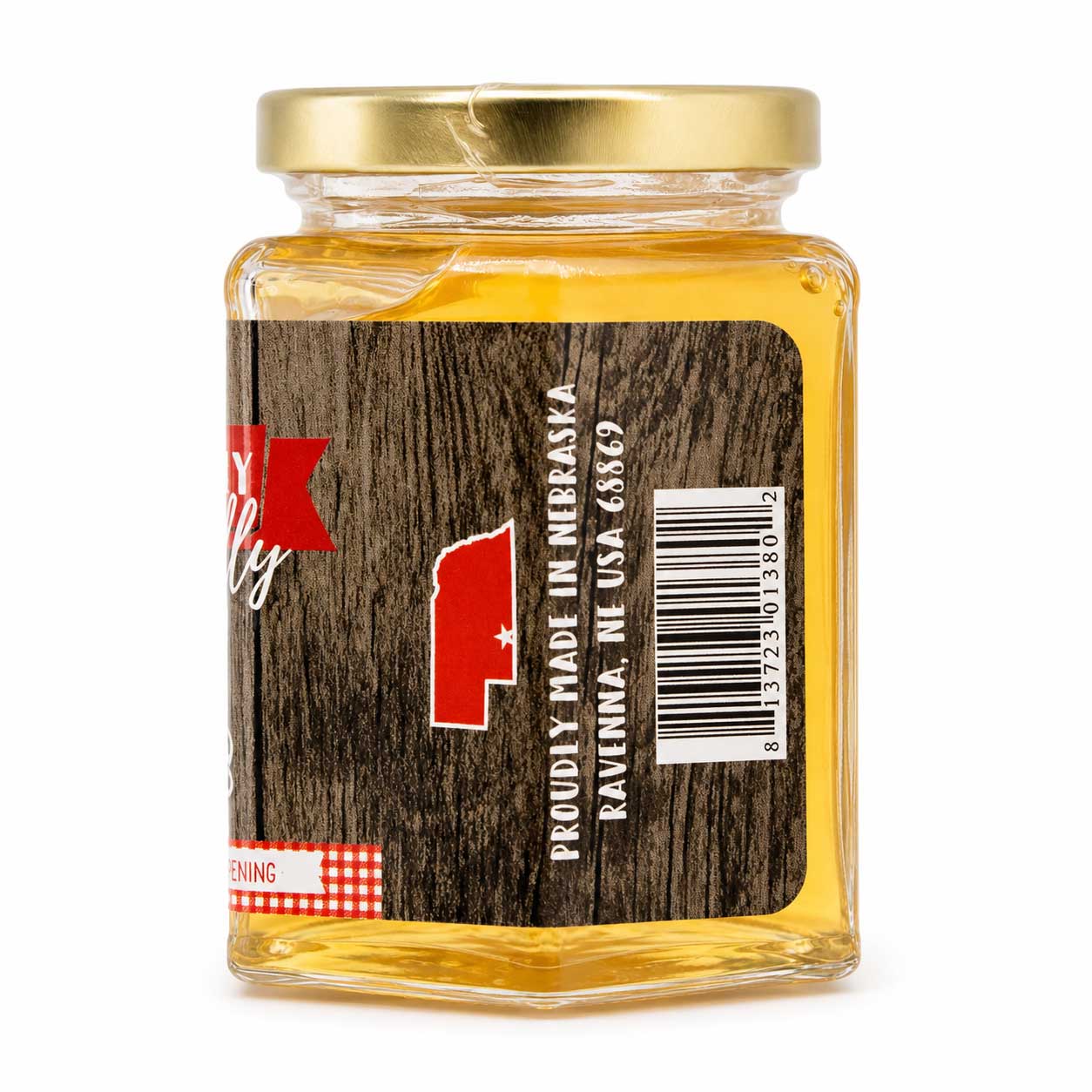 Sweet Corn Cob Jelly in a 9 oz jar by Nutt Family Jams, showcasing the golden jelly with corn kernels on the label.
