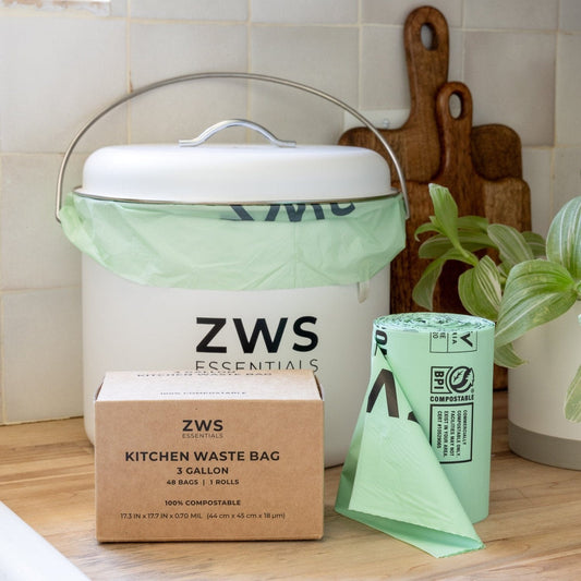 White countertop compost bin from ZeroWasteStore.com, compact kitchen composting container for food scraps and organic waste.