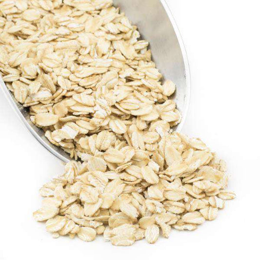 Organic thick rolled oats from Country Life Natural Foods in a 5 lb bag, showcasing the oats' textured surface and natural appearance.