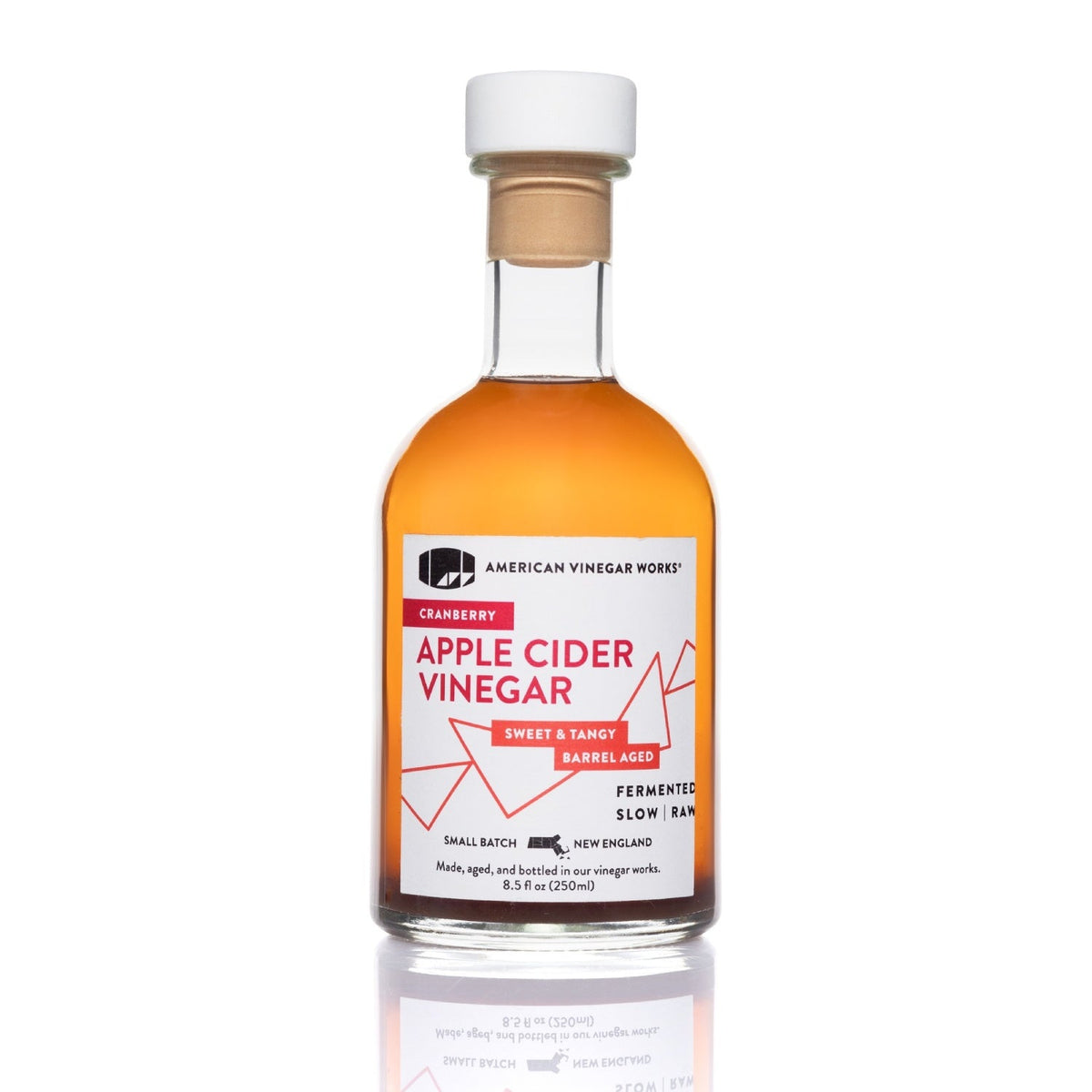Front view of 250ml bottle of American Vinegar Works cranberry apple cider vinegar showing the label and clear glass bottle.