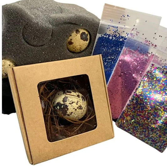 Quailz.com gender reveal idea kit with hollow quail eggs, glitter, and craft box for creative baby shower activities.
