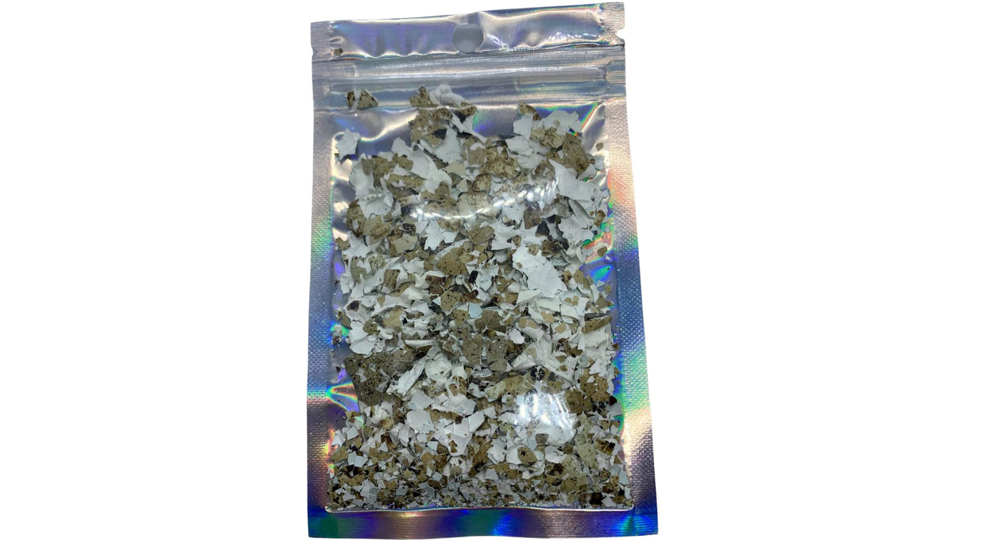 Organic hermit crab food by Quailz.com featuring quail egg shells, showing calcium-rich treats for healthy shell growth in pet hermit crabs.