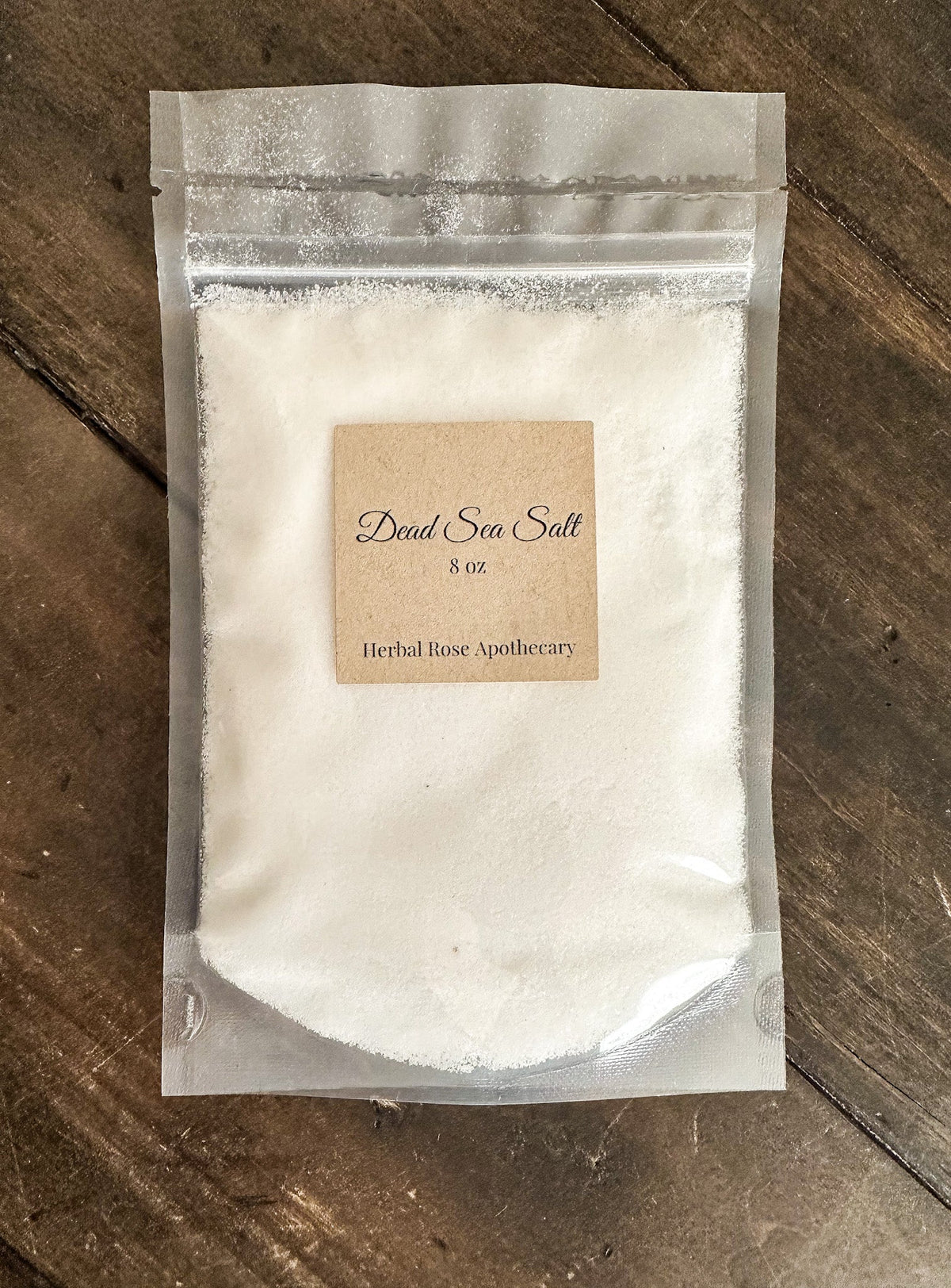8oz HerbalRoseApothecary Dead Sea Salt with oats, natural mineral-rich salts for skincare and relaxation.
