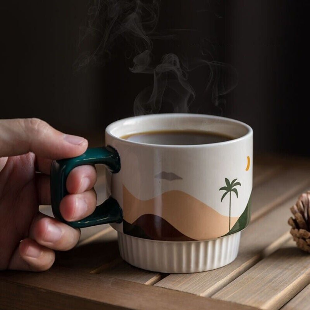 Handcrafted ceramic Desert Vibe Artisanal Mug with desert oasis design by Tilley + Me, featuring earthy tones and textured surface.