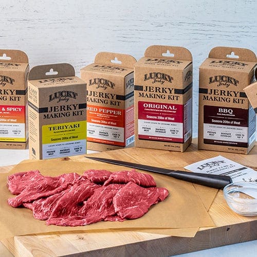 Assorted beef jerky slices in a variety pack from Nebraska Star Beef, displayed in a circular arrangement.
