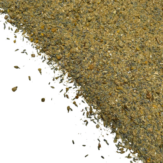 Bottle of Dragonfly Elements Chamomile and Lavender Herbal Tea Blend 1 oz with dried chamomile and lavender flowers.
