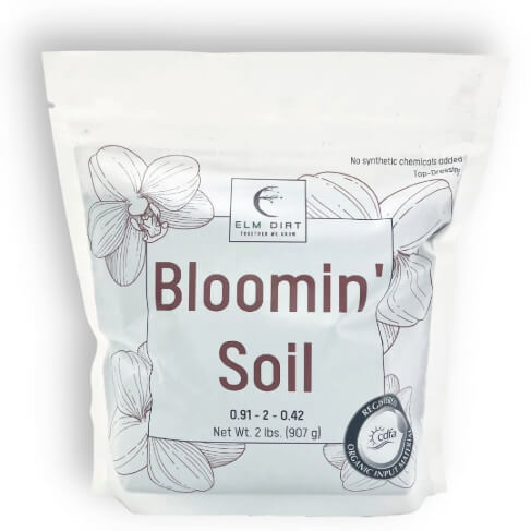 Elm Dirt Bloomin' Soil organic flower booster bag, 2 lbs, for bigger, longer-lasting blooms in garden flowers.