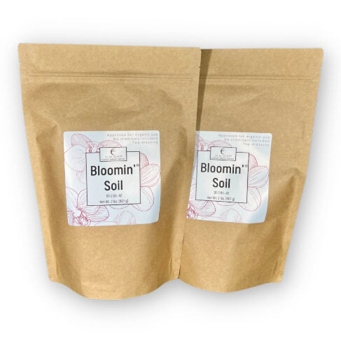 Elm Dirt Bloomin' Soil organic flower booster bag with 2 lbs for bigger, longer-lasting blooms in garden flowers.