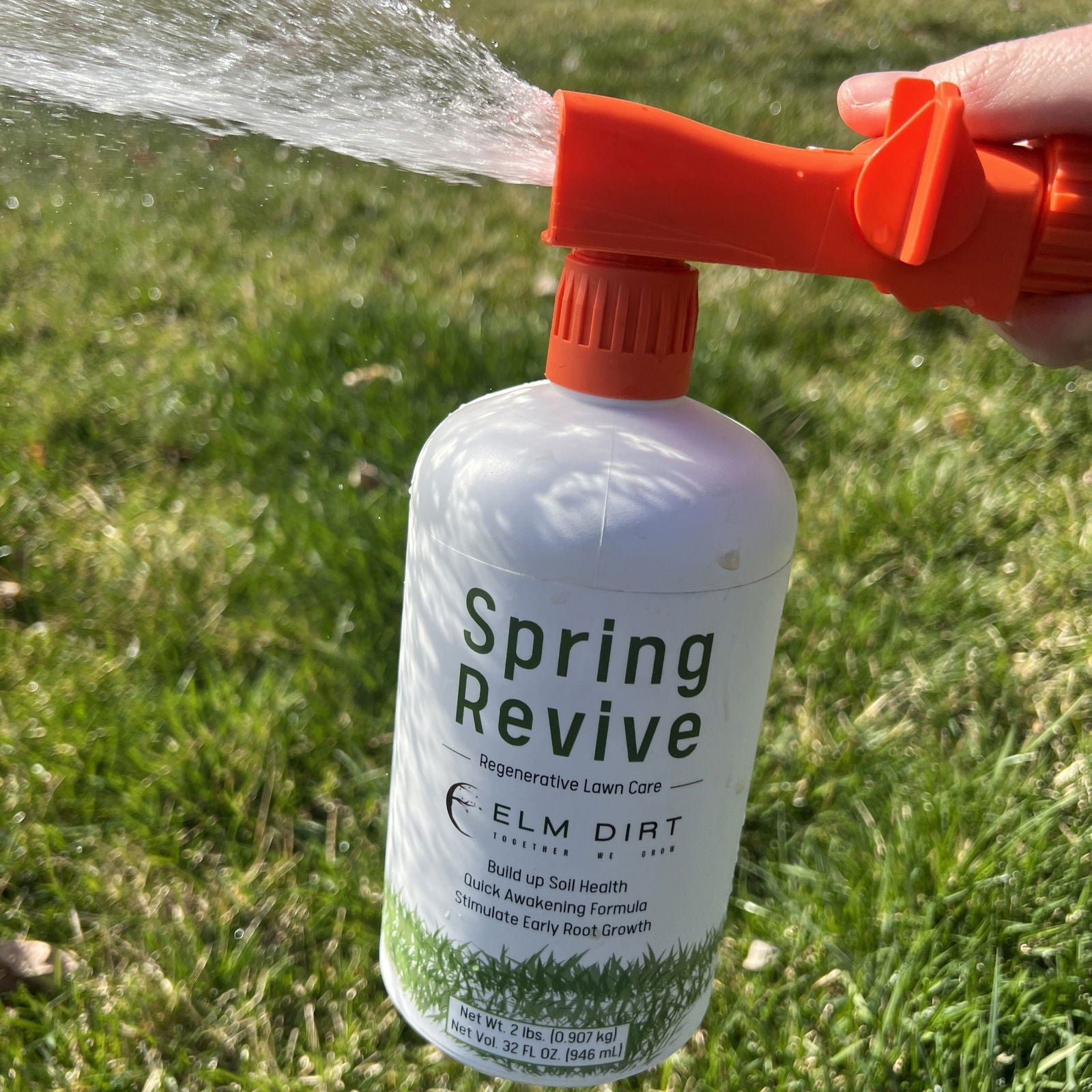 Elm Dirt regenerative fertilizer for sustainable lawn care, shown in a bag designed for 2000 sq ft of healthy, lush grass.