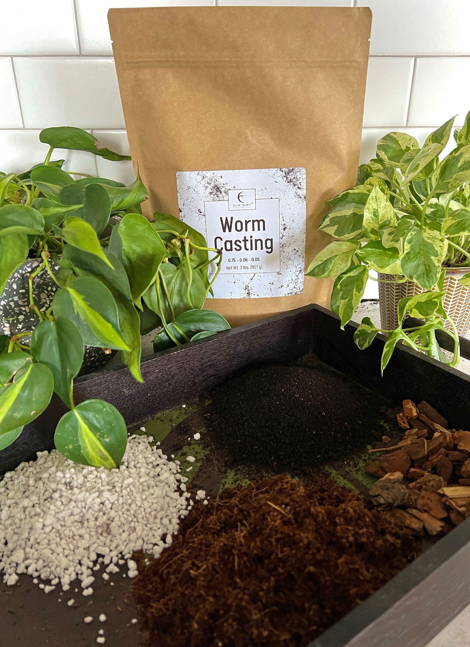 Two pounds of Elm Dirt worm castings, organic soil amendment with rich, dark worm castings in a natural, nutrient-rich form.