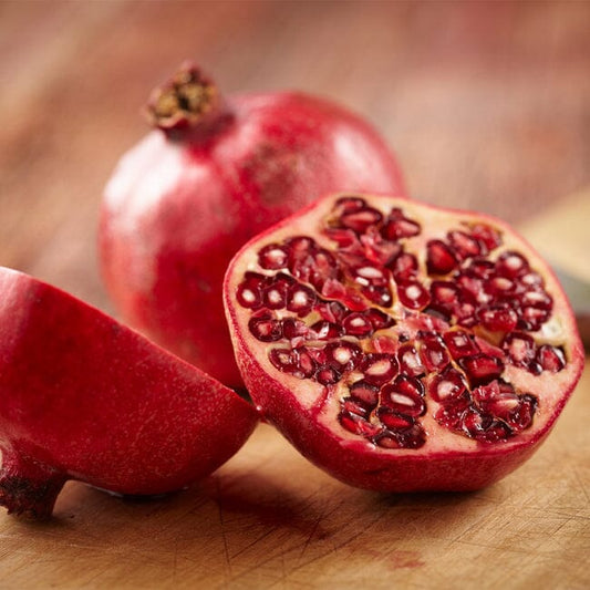 Everglades Farm pomegranate tree with red fruit, 24-30 inches tall, 1-gallon size, healthy fruit-bearing fruit tree.