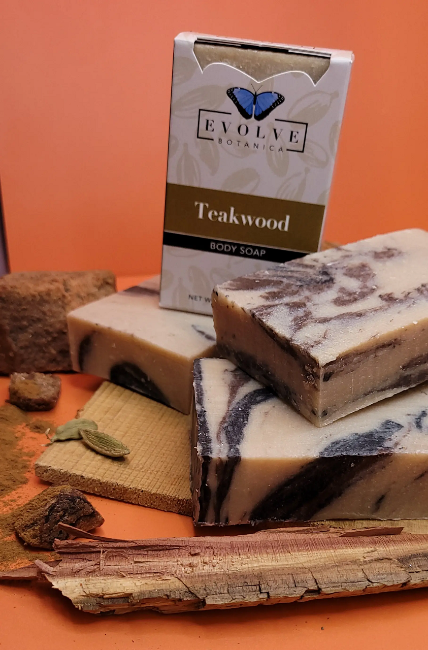 Evolve Botanica teakwood scented standard soap bar in branded packaging, showcasing natural ingredients and elegant design.
