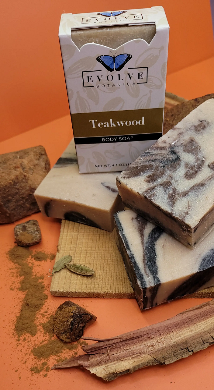 Evolve Botanica Standard Soap with teakwood scent, in branded packaging, showcasing a rectangular soap bar.