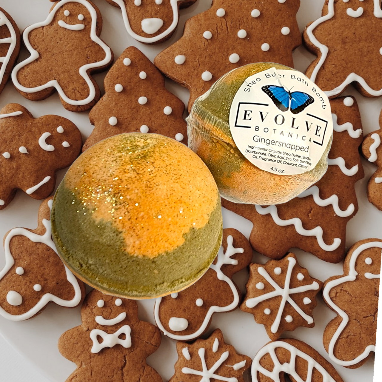 Evolve Botanica Gingersnapped bath bomb with festive holiday colors and scents, shaped for a relaxing Christmas bath experience.