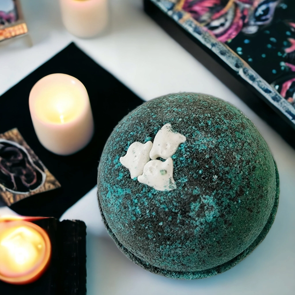 Evolve Botanica Haunted Halloween bath bomb with spooky orange and black design, perfect for seasonal bath time relaxation.