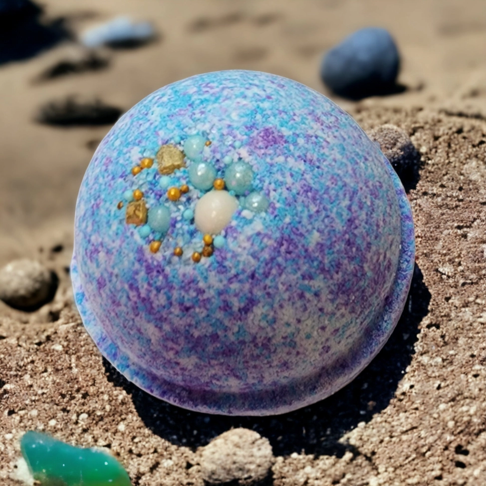 Evolve Botanica Sea Glass Bath Bomb with vibrant blue and green colors, floating in water with a relaxing, aromatic scent.