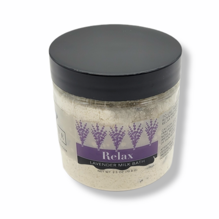 Evolve Botanica Relax Lavender Milk Bath Mini jar with lavender flowers and creamy bath soak for soothing relaxation.