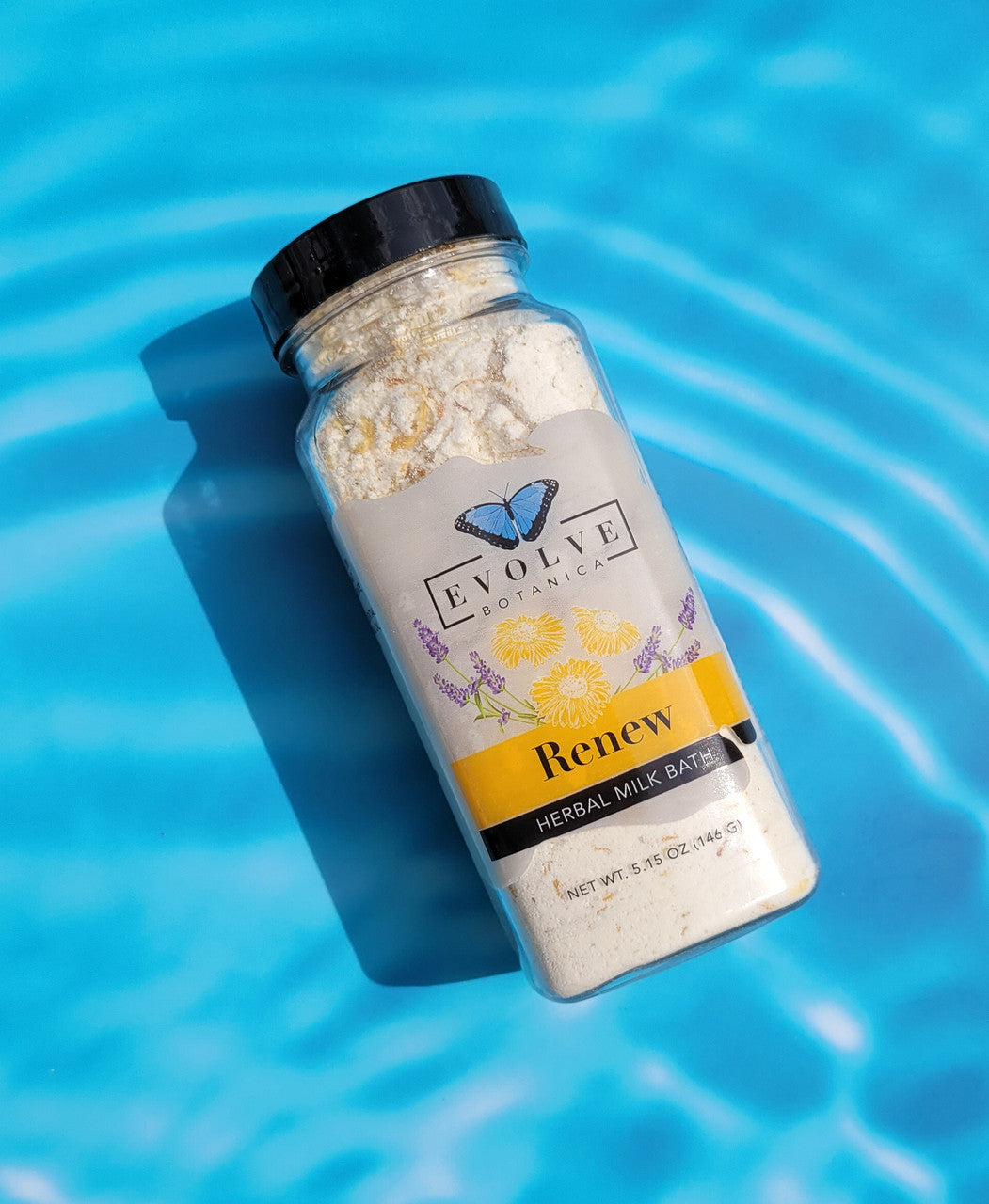 Herbal Milk Bath by Evolve Botanica with dried herbs and natural ingredients in a glass jar, ready for relaxing bath soak.