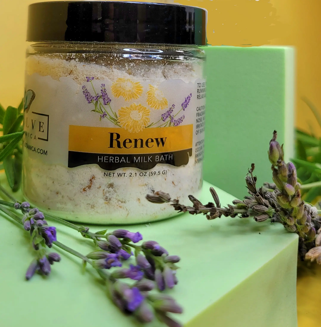 Mini Evolve Botanica Milk Bath Renew Herbal package with herbal ingredients and soft pastel packaging.