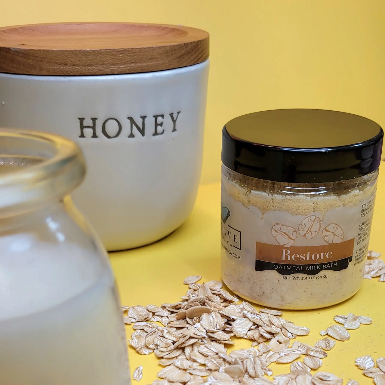 Mini Evolve Botanica Milk Bath Restore with Oatmeal in a jar, featuring soothing ingredients for relaxing bath experience.