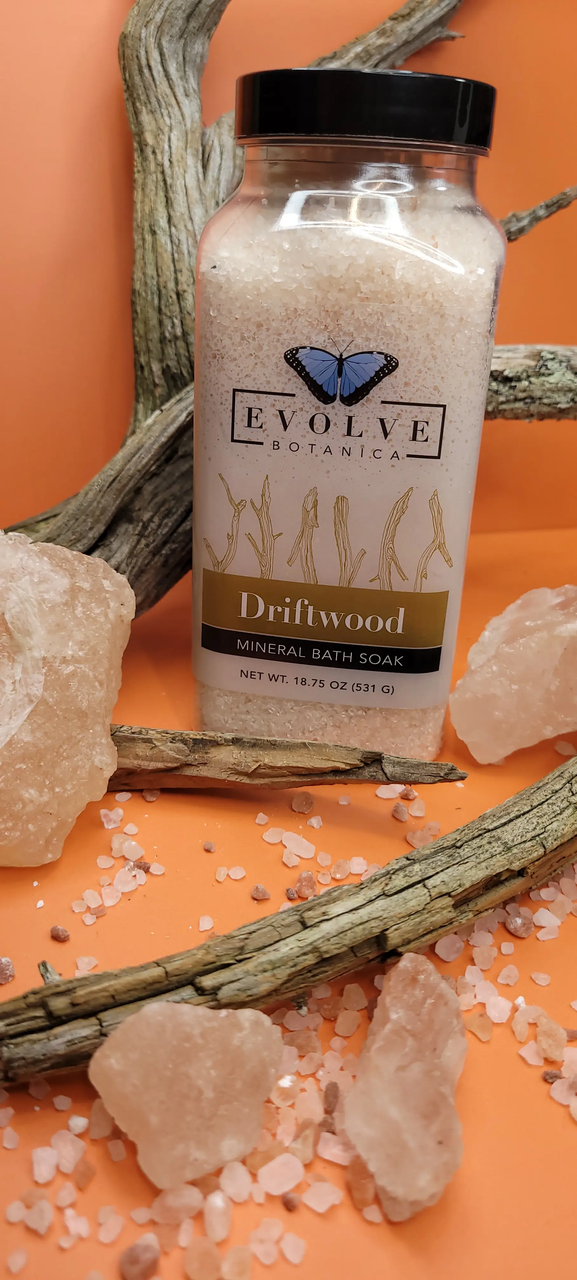 Evolve Botanica Mineral Soak Driftwood bath salt in a jar with natural driftwood and sea minerals for relaxing bath experience.