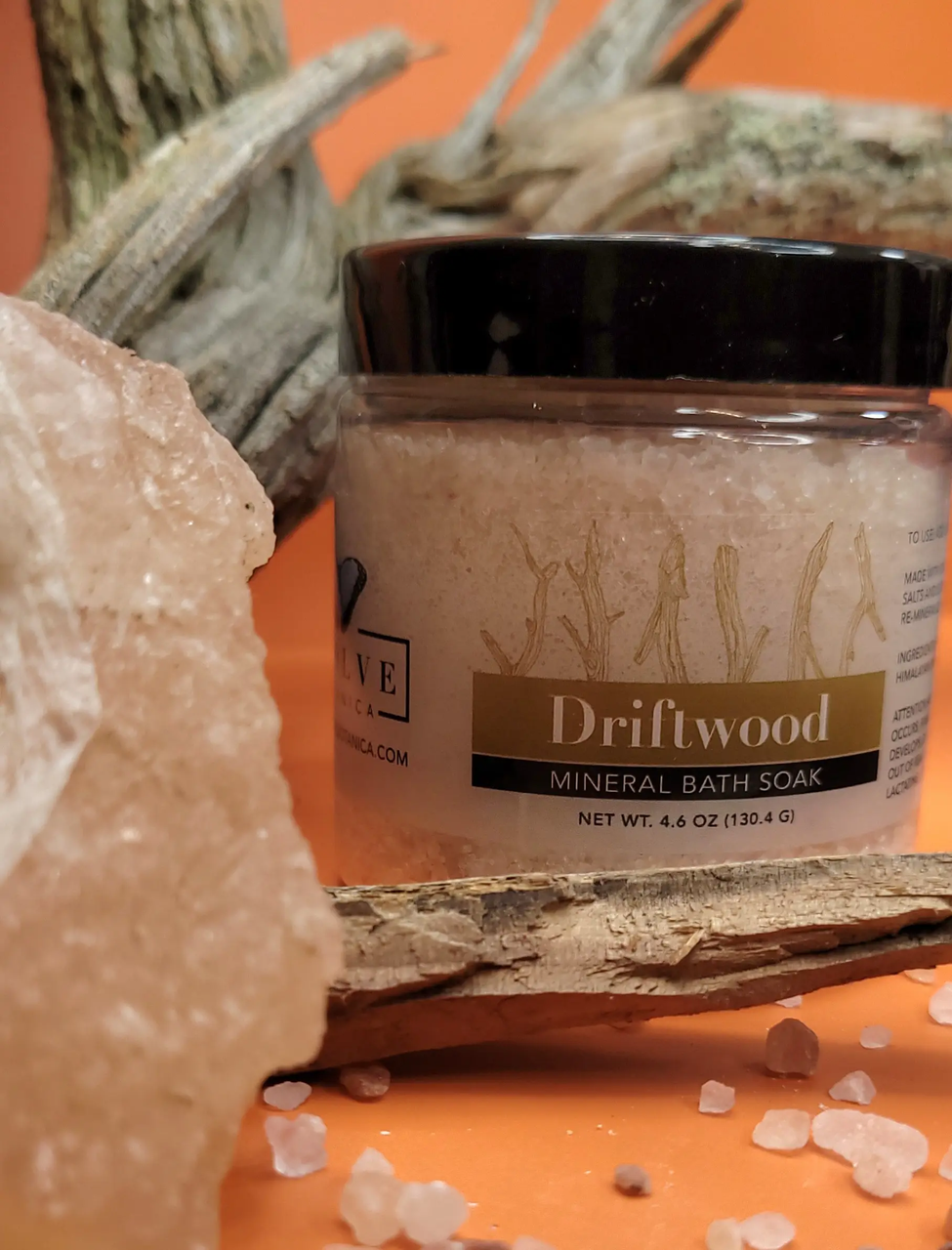 Mini mineral soak bath salt by Evolve Botanica in Driftwood scent, featuring natural mineral crystals for relaxing bath experiences.