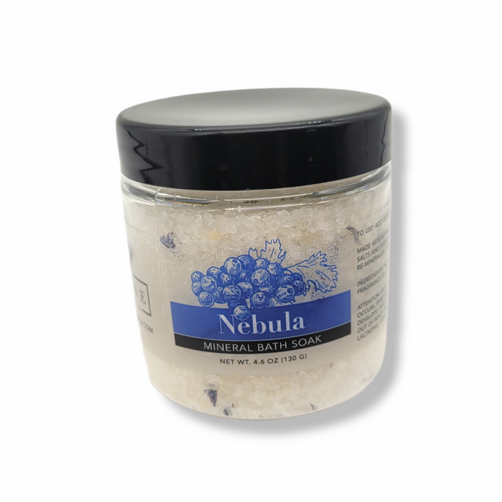 Mini Evolve Botanica Mineral Soak Nebula bath salt jar with purple and white label, designed for relaxing bath experiences.