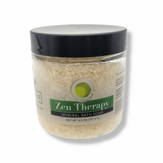 Mini Evolve Botanica Mineral Soak Zen bath salt container with pink and white label, showcasing calming botanical ingredients.