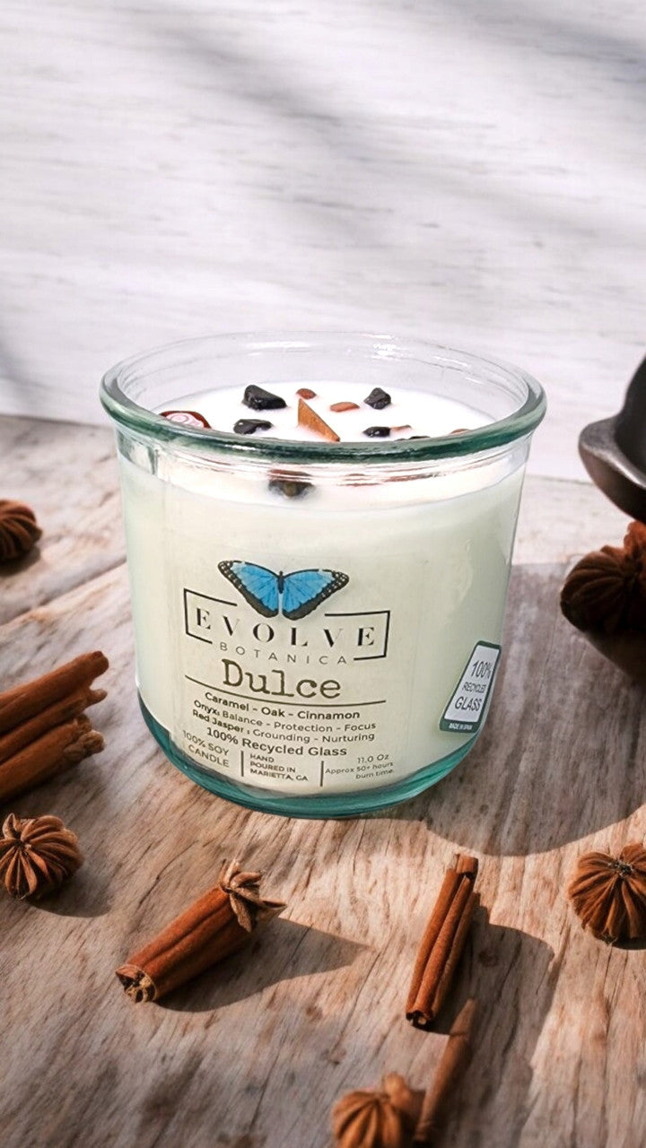 Evolve Botanica Rocks Candle Dulce with red jasper and onyx gemstones, soy wax, and a wood wick for a calming ambiance.