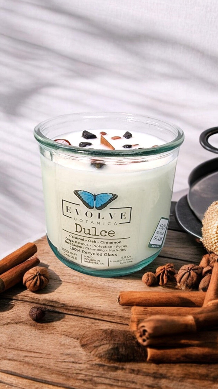 Evolve Botanica Rocks Candle Dulce with wood wick, red jasper, and onyx gemstones in a soy candle.